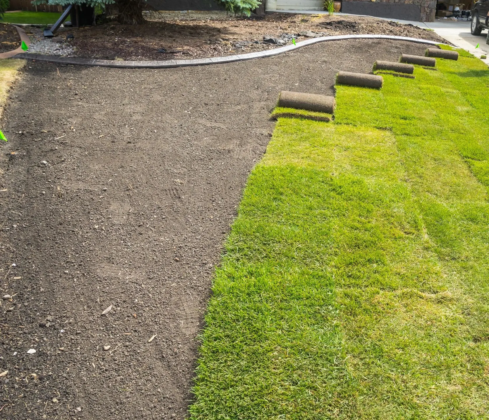 A lawn that has been laid out with grass.